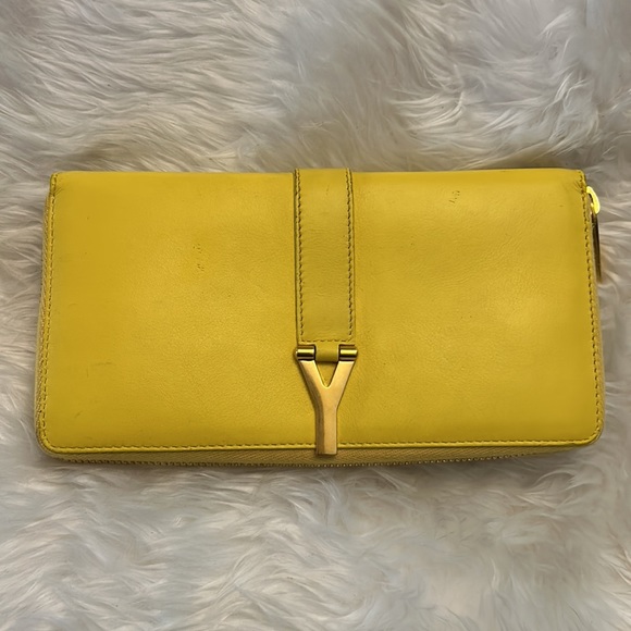 Yves Saint Laurent Handbags - Yves Saint Laurent Paris Pretty Yellow leather zip around wallet